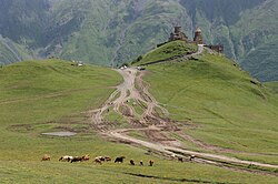 Landscape in Georgia, gergeti trinity church mountain pasture